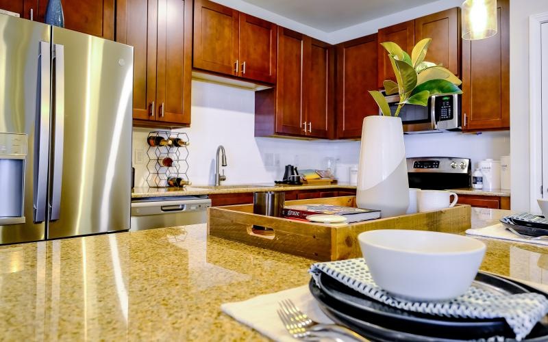 large kitchen countertop with pendant lighting