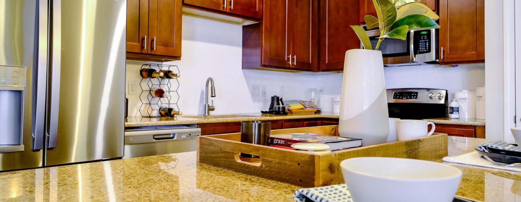 large kitchen countertop with pendant lighting